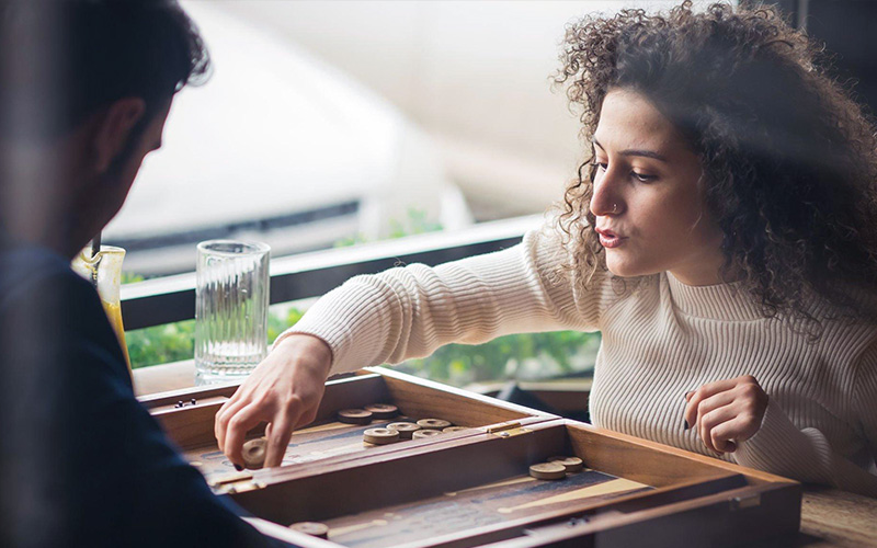 Explore Backgammon Playing Styles